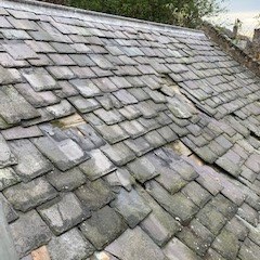 slate roof in need of repair